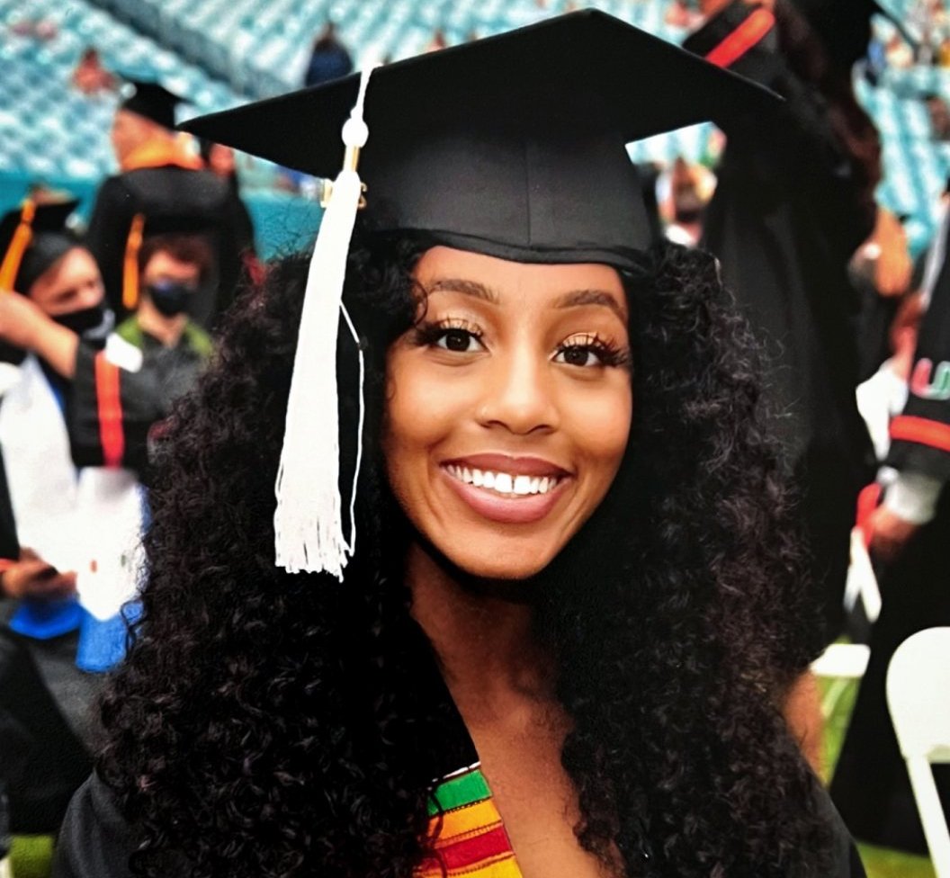 A professional portrait of Sarah Decossard.