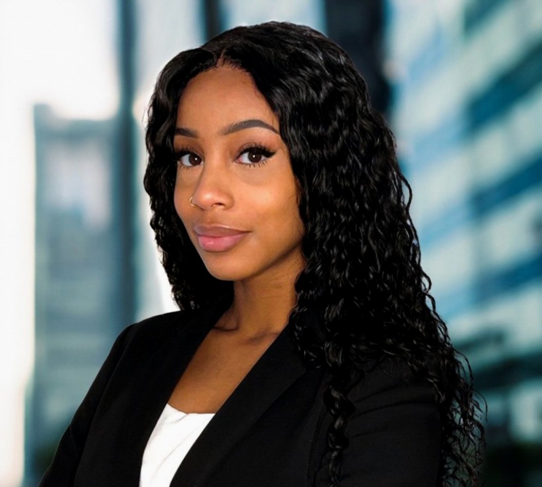 A professional portrait of Sarah Decossard.